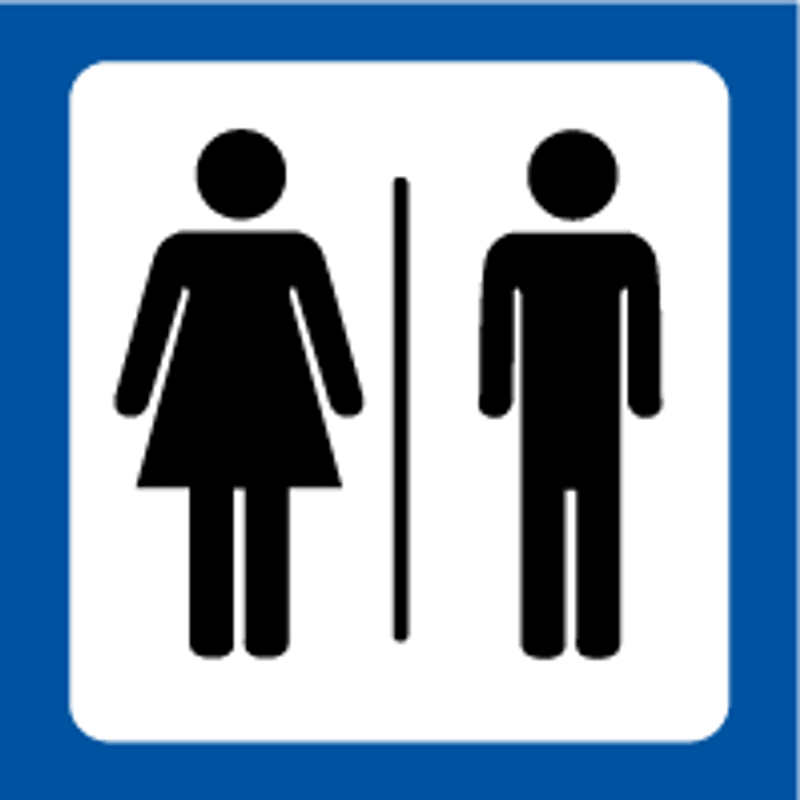 Toalettskilt med symbol for Dame og Herre